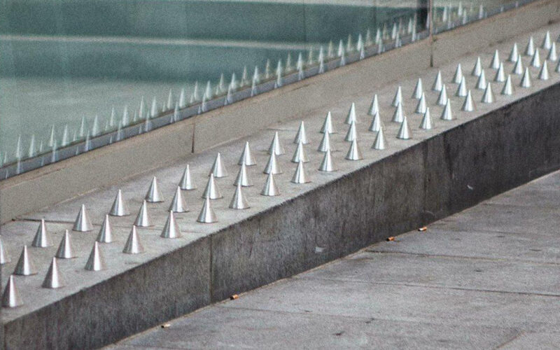 Spikes placed on steps near buildings